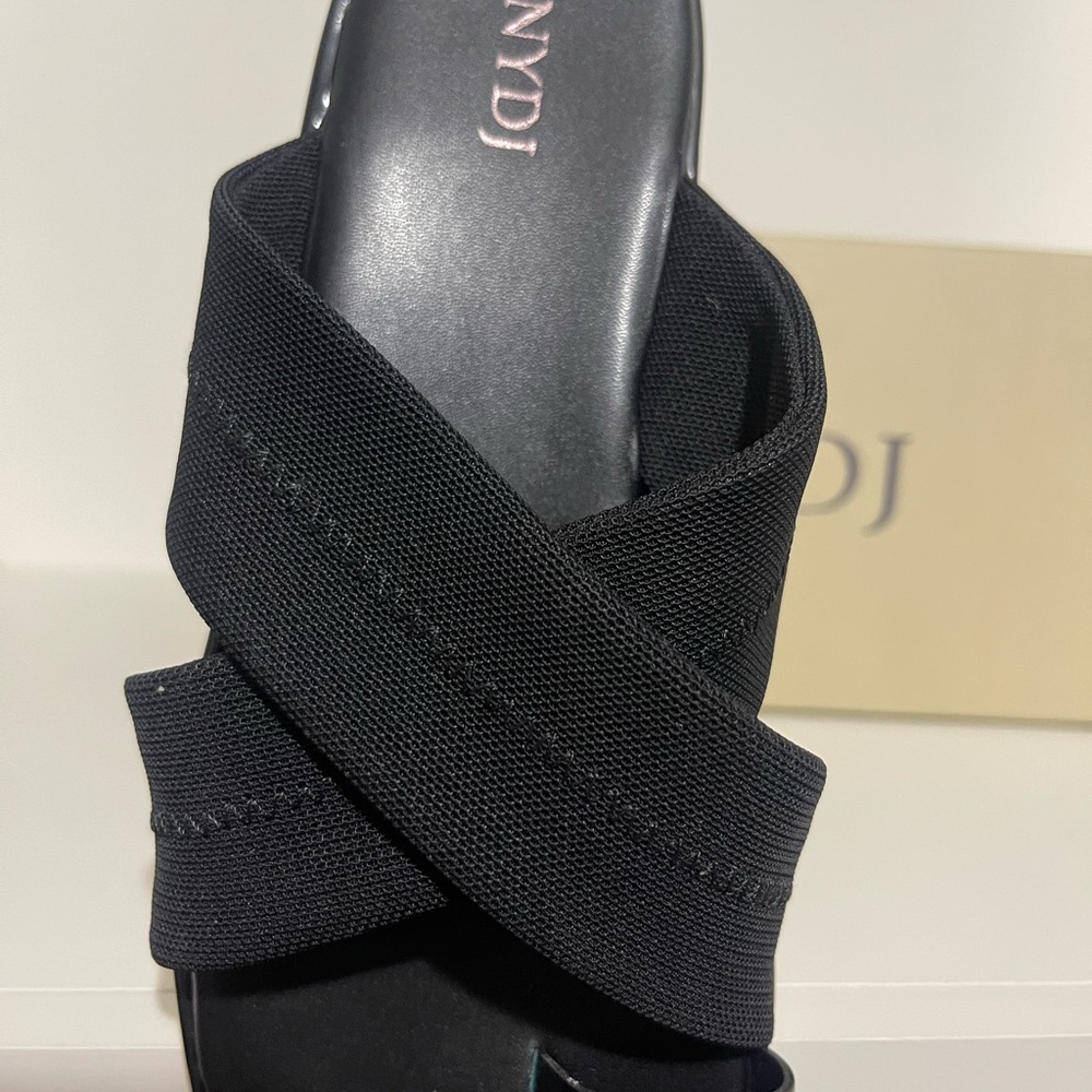 comfort as you walk on the streets wearing the NYDJ® Ronna footwear. - Picture 4 of 6